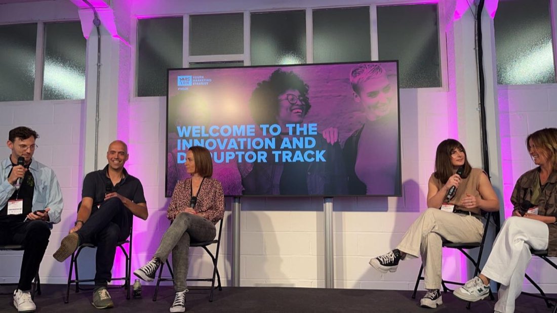 Scott on a panel at a conference